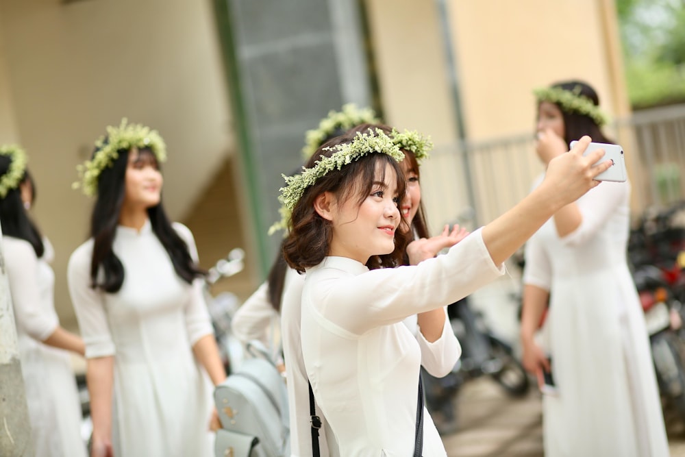 woman wearing floral headgear