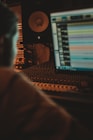 man looking flat screen computer monitor