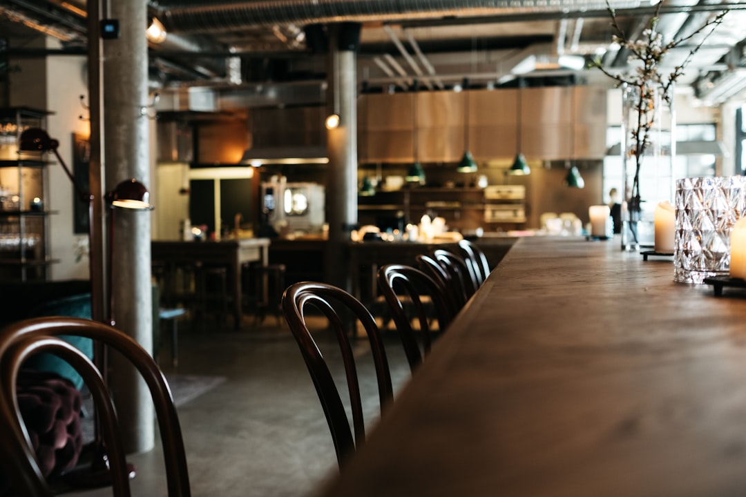 empty brown wooden restaurant table with chairs, www.jonasjacobsson.co