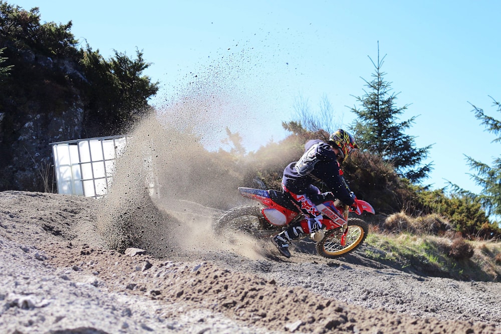 man riding on motocross dirt bike