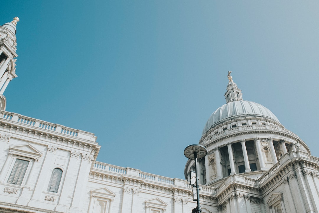 white concrete church under blue sky