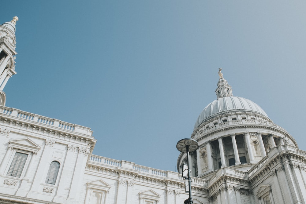 white concrete church under blue sky