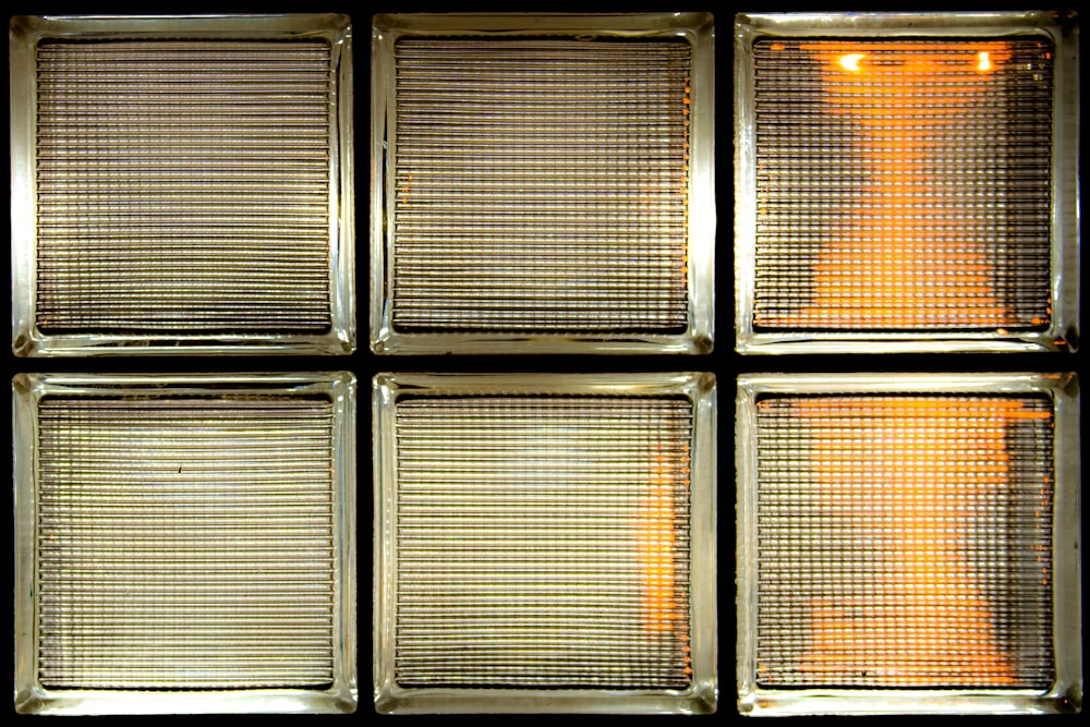 a close up of a window with a reflection of a person