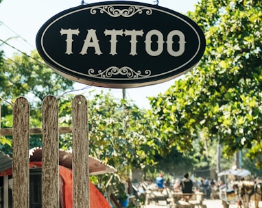 black and white Tattoo-printed signage