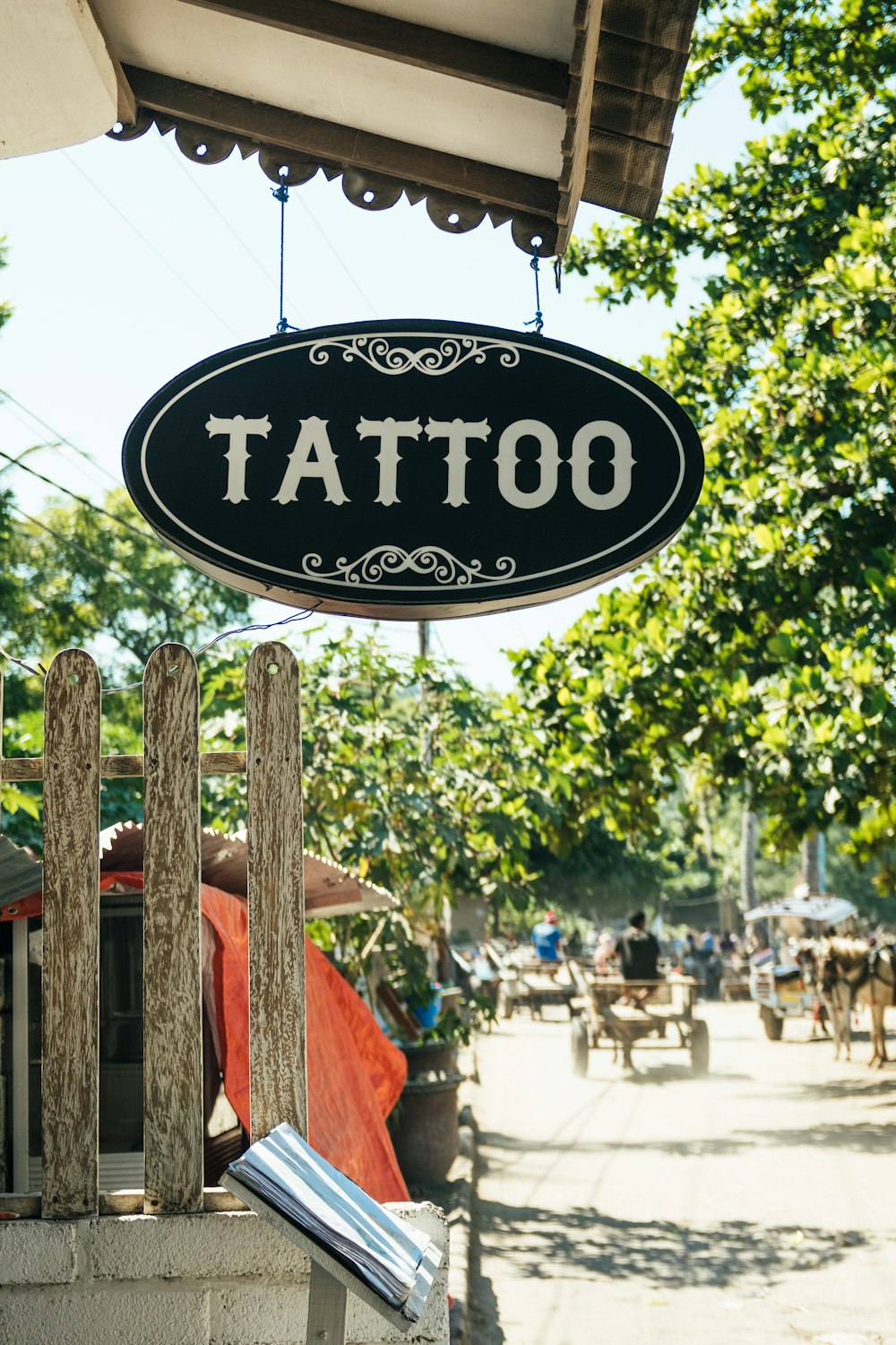 black and white Tattoo-printed signage