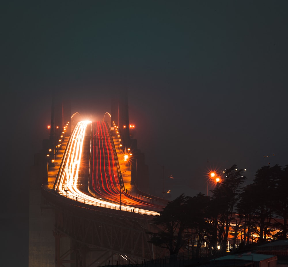 time lapse photography of cars on bridge