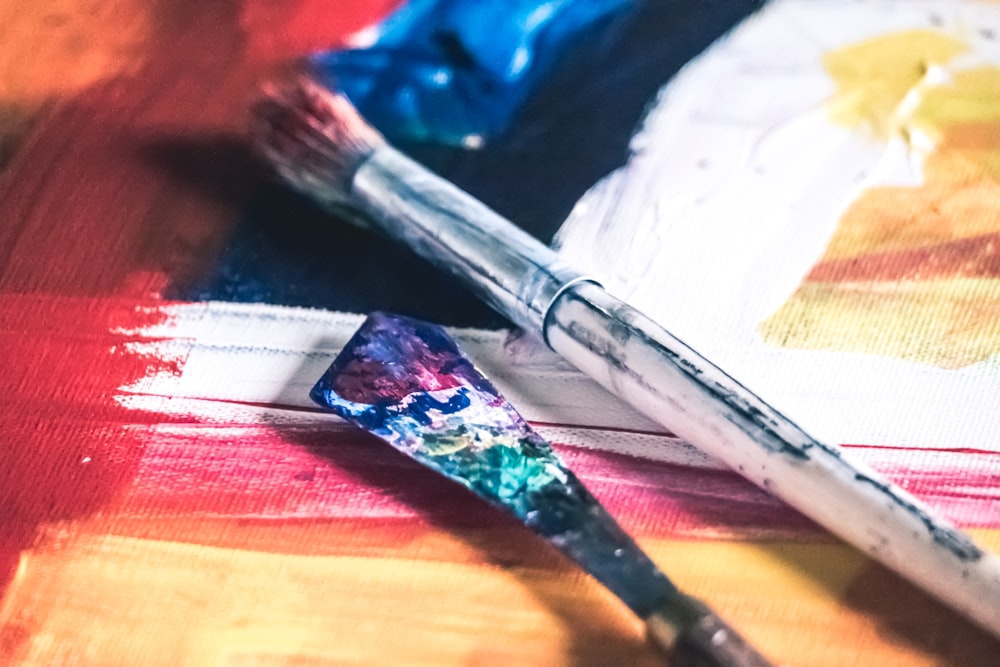 blue and silver paint brush