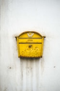 brass-colored mailbox