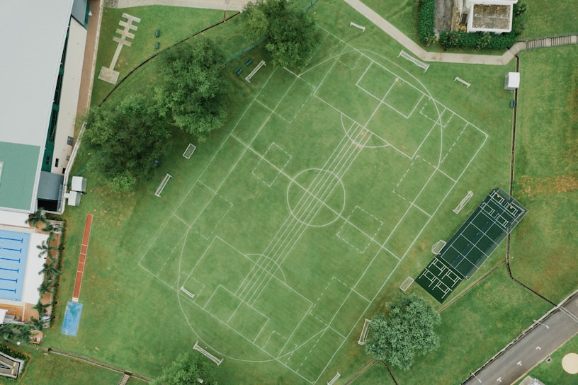 Aerial view of a newly constructed sports complex showcasing precise layout and clean lines.