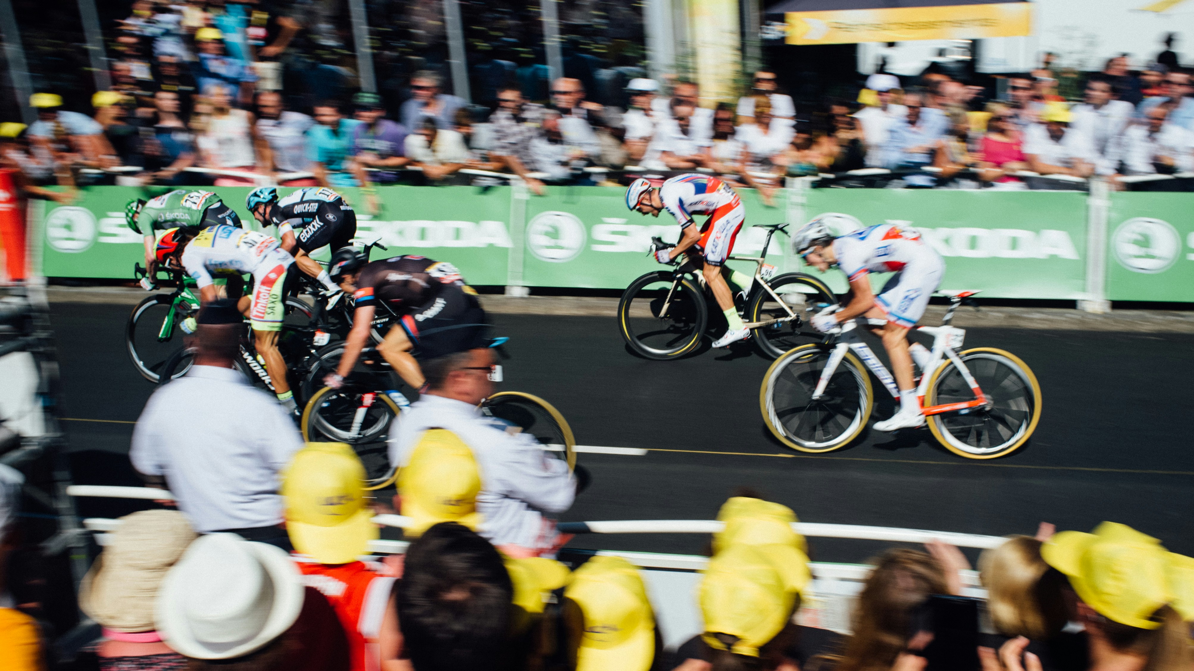 group of people watching cyclist racing, Tour de France