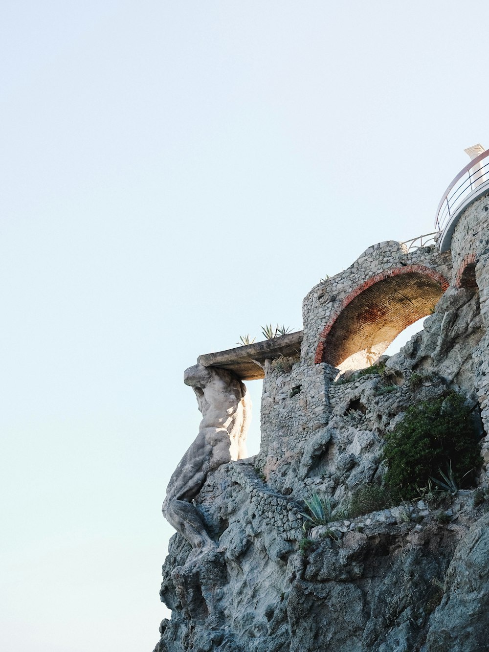 stone structure near cliff