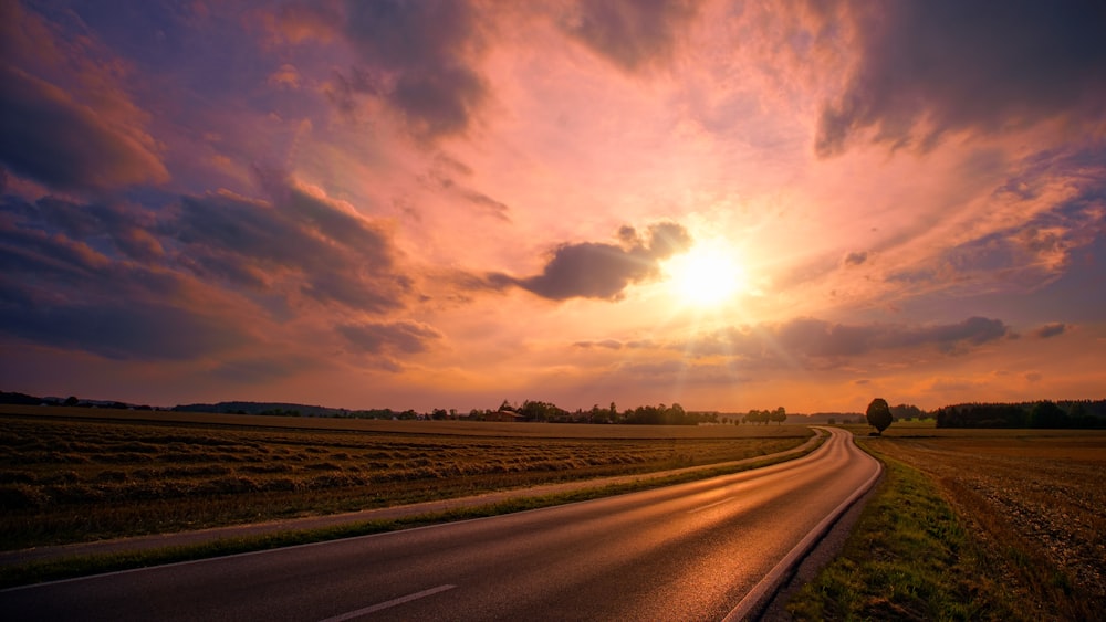 gray road during sunset