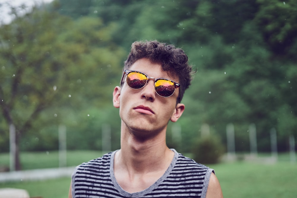 man standing wearing sunglasses