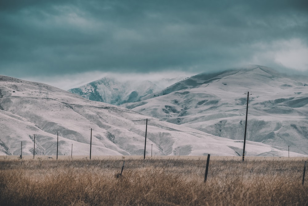 snowy mountain near post