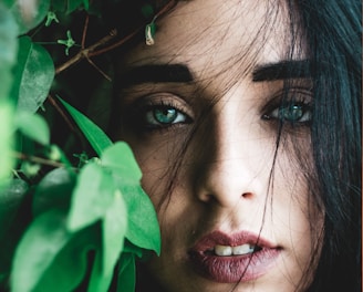 portrait photography of woman with blue eyes