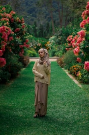 woman standing on green grass