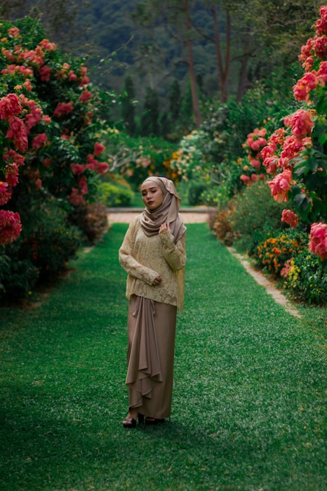 woman standing on green grass