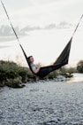 man lying on hammock