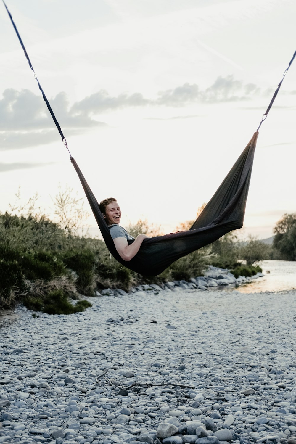 man lying on hammock