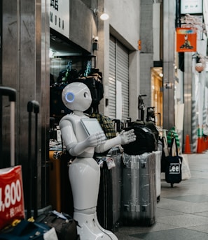 robot standing near luggage bags