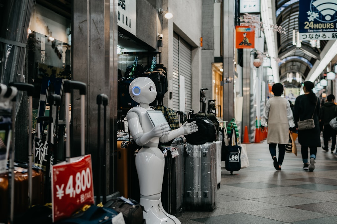 robot standing near luggage bags, Robot in Shopping Mall in Kyoto
