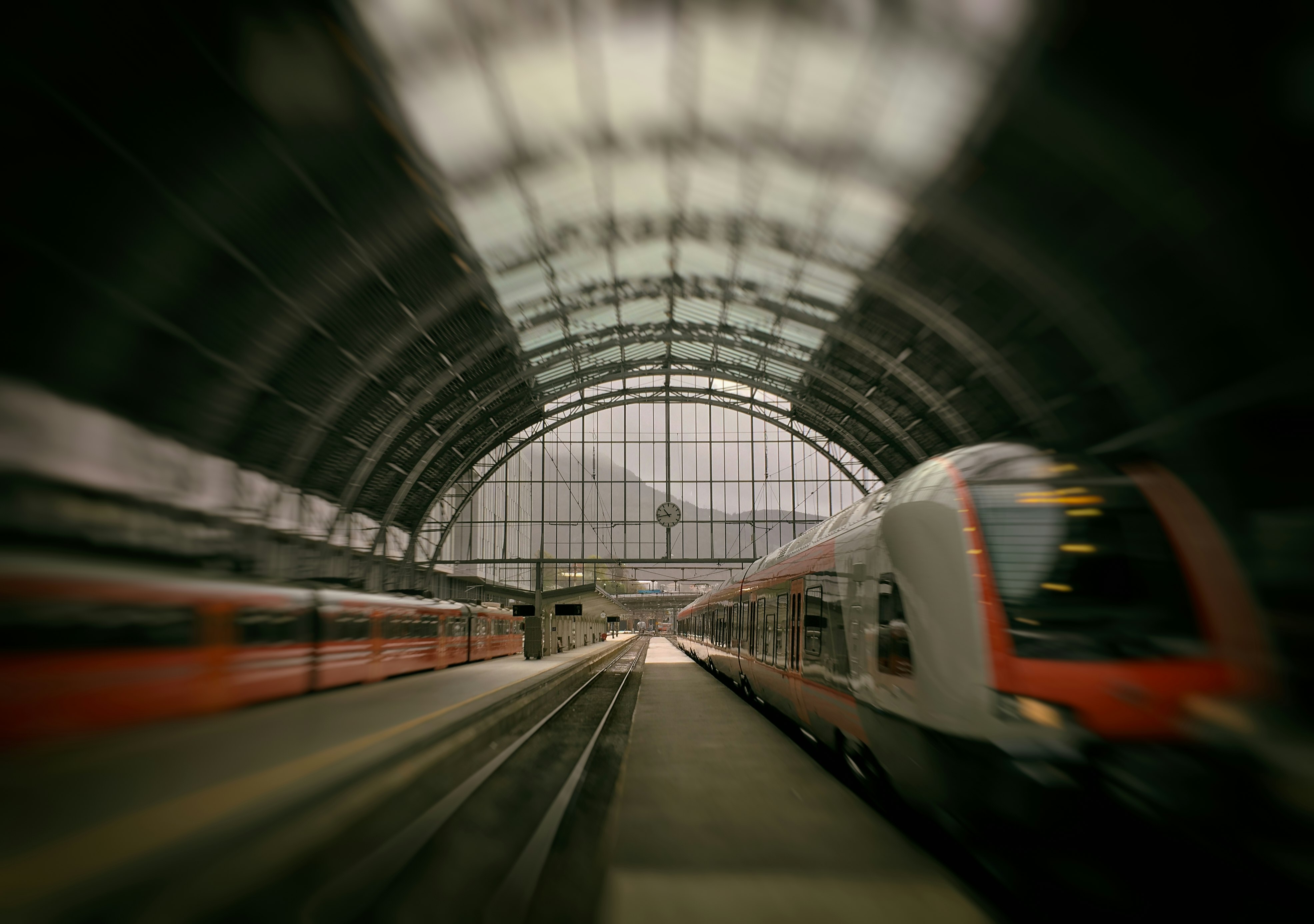 train passing on rail inside stadium