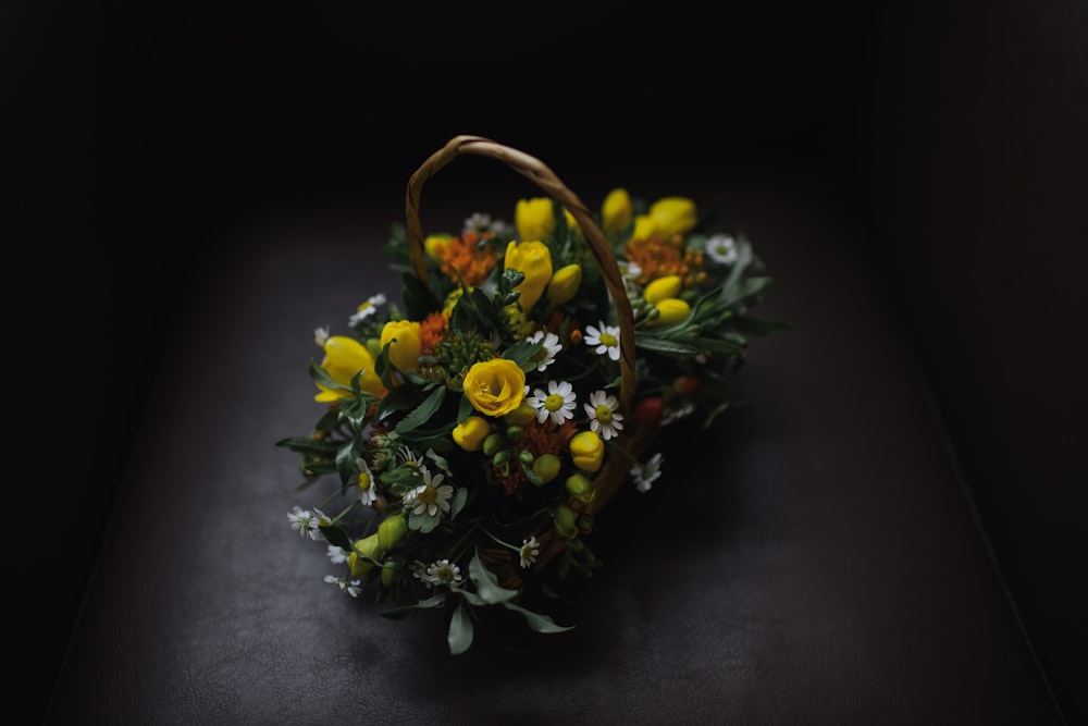 bouquet of flowers on basket