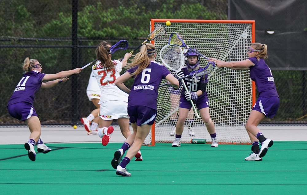 women playing lacrosse