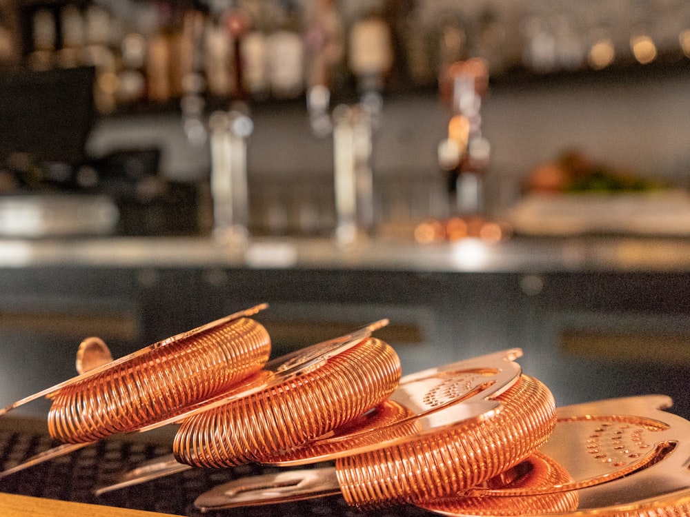 a close up of a pile of copper coils