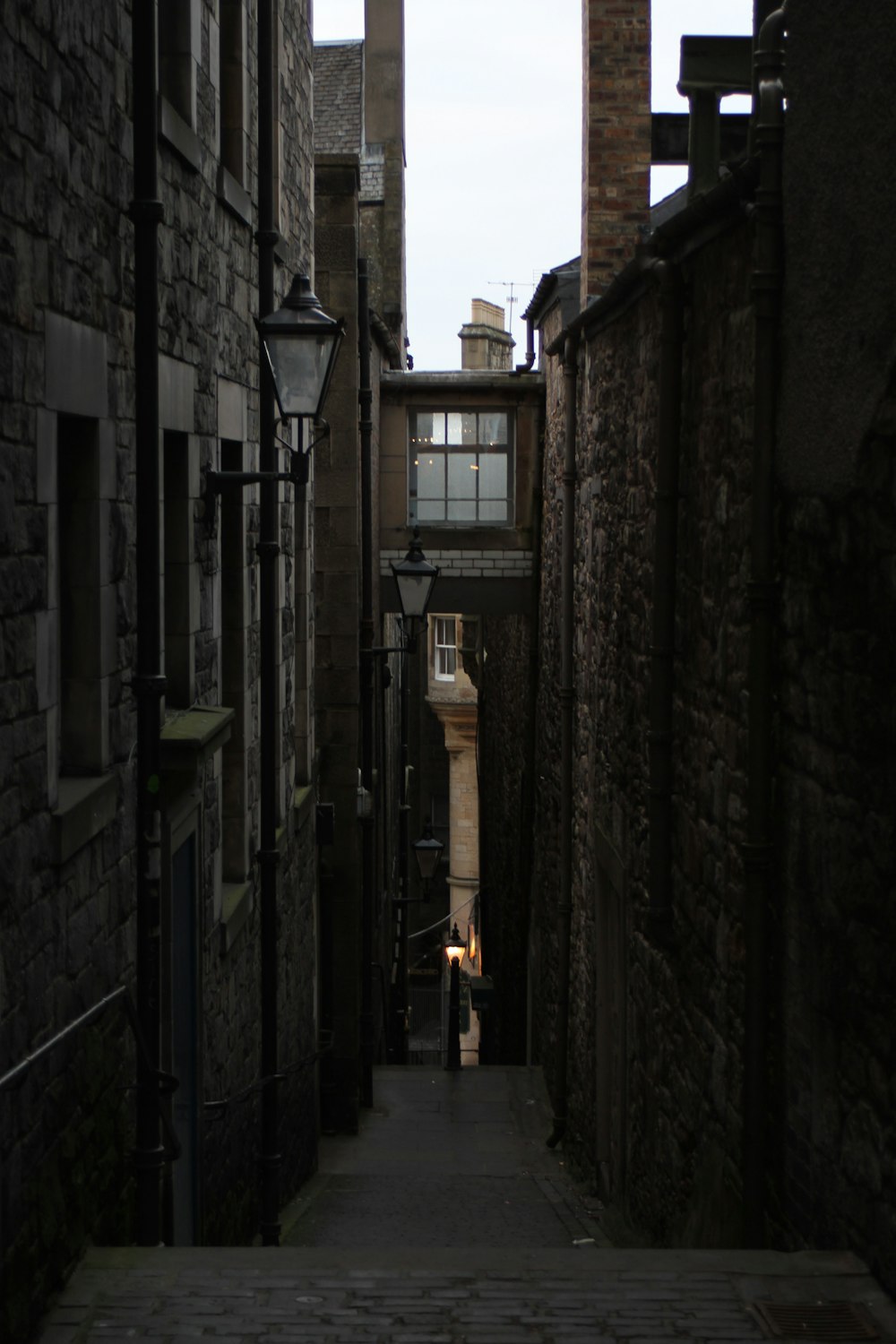 stairs pathway between two concrete houses with