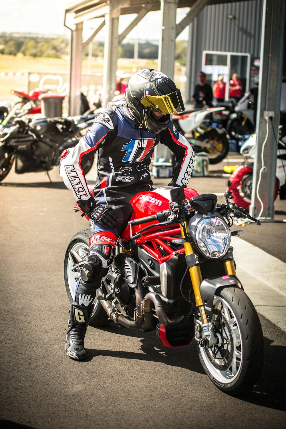 person riding sports bike