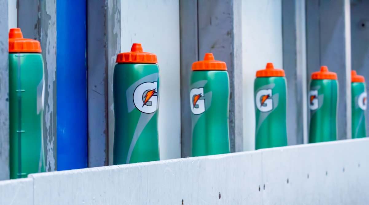 Gatorade sports bottle on top of gray surface
