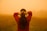 woman standing on green grass during daytime