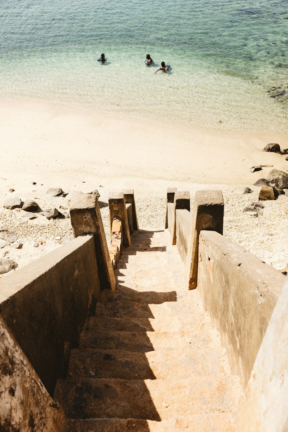 concrete stairs going to seashore