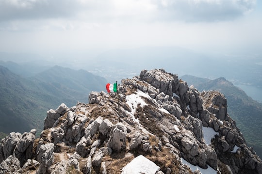 flag of Italy on stone mountain in Monte Resegone Italy