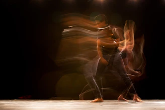 Person exploring gentle movement as part of Dance Movement Psychotherapy