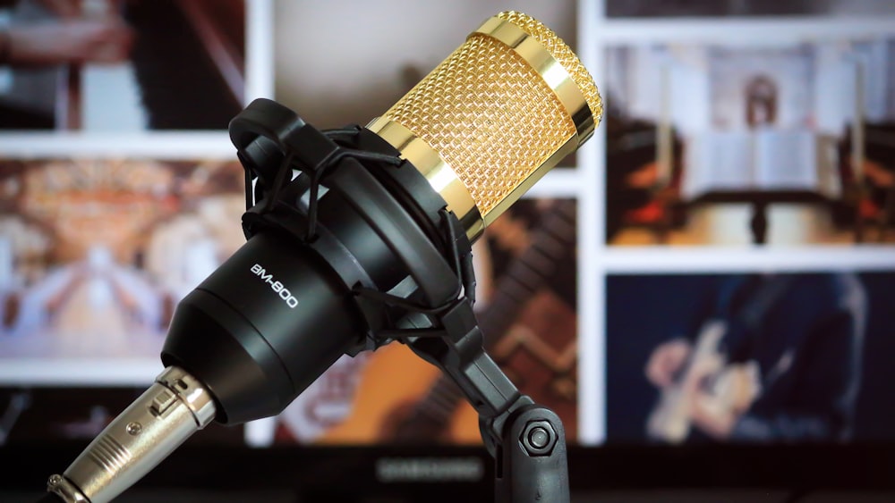 black and brass condenser microphone