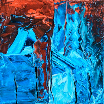 Abstract painting with swirling bright reds and blues depicting dynamic energy.