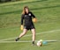 woman playing soccer