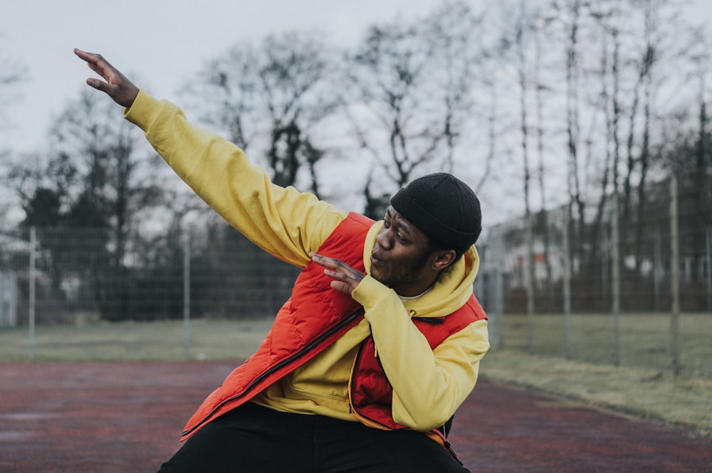 man doing dab pose