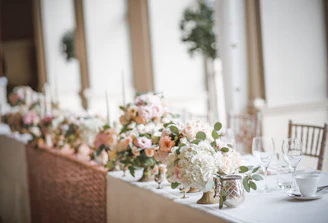 Elegant wedding balloon centerpiece with soft pastel colors.