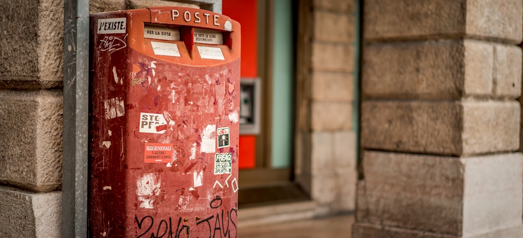 tilt shift lens photography of red steel case