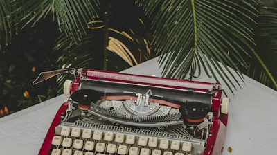 red and gray typewriter