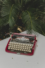 red and gray typewriter