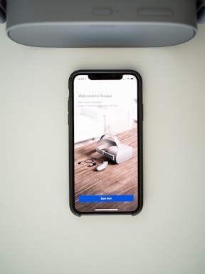 A friendly person holding a smartphone, ready to assist with vrtrip inquiries.