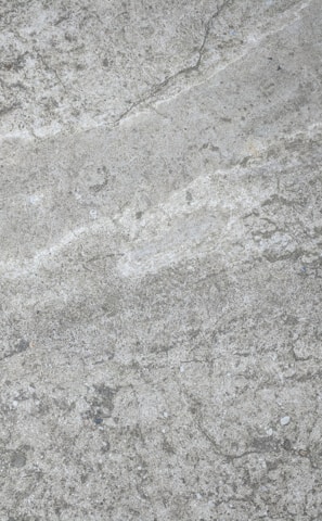 a close up of a gray marble surface