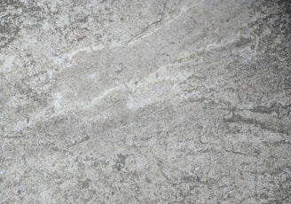 a close up of a gray marble surface