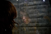 woman looking at the floor