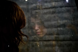 woman looking at the floor