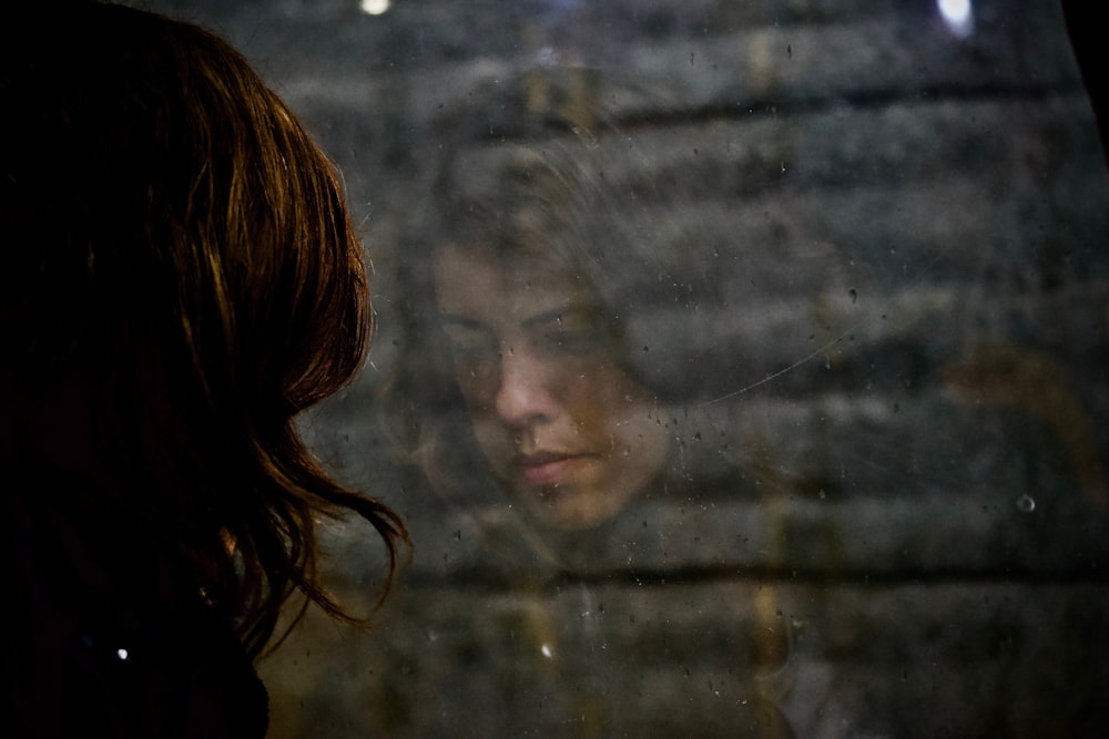 woman looking at the floor